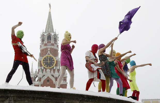 Members of the Russian radical feminist group'Pussy Riot' stage a protest